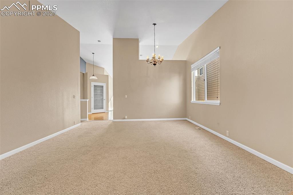 9403 St.George Road Peyton, CO 80831 - Photo 8 of 44 an empty room with windows and closet