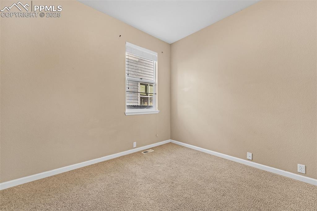 9403 St.George Road Peyton, CO 80831 - Photo 9 of 44 an empty room with windows
