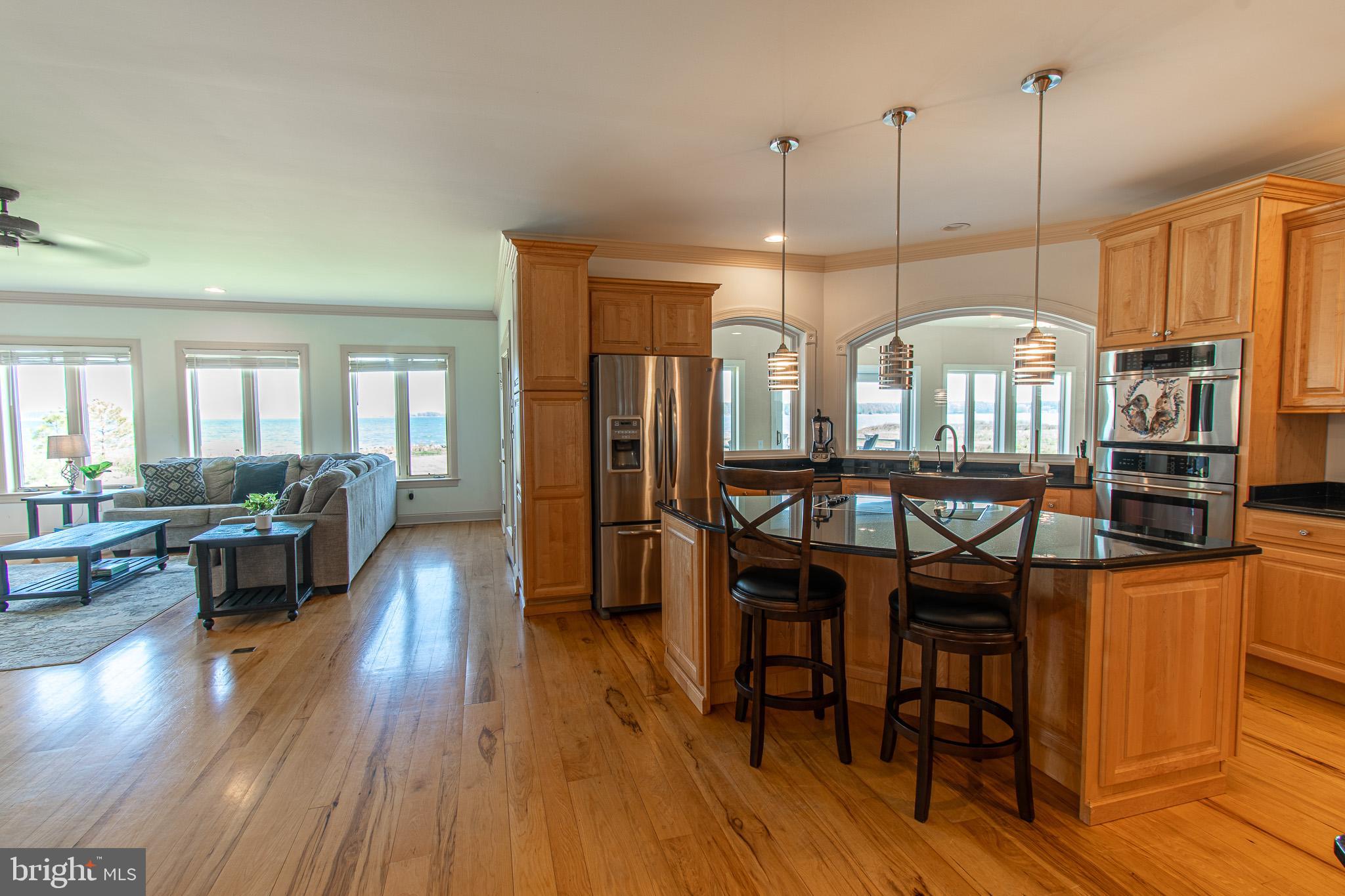 5227 Brooks Road Woolford, MD 21677 - Photo 20 of 68 a view of a dining room with furniture window and wooden floor