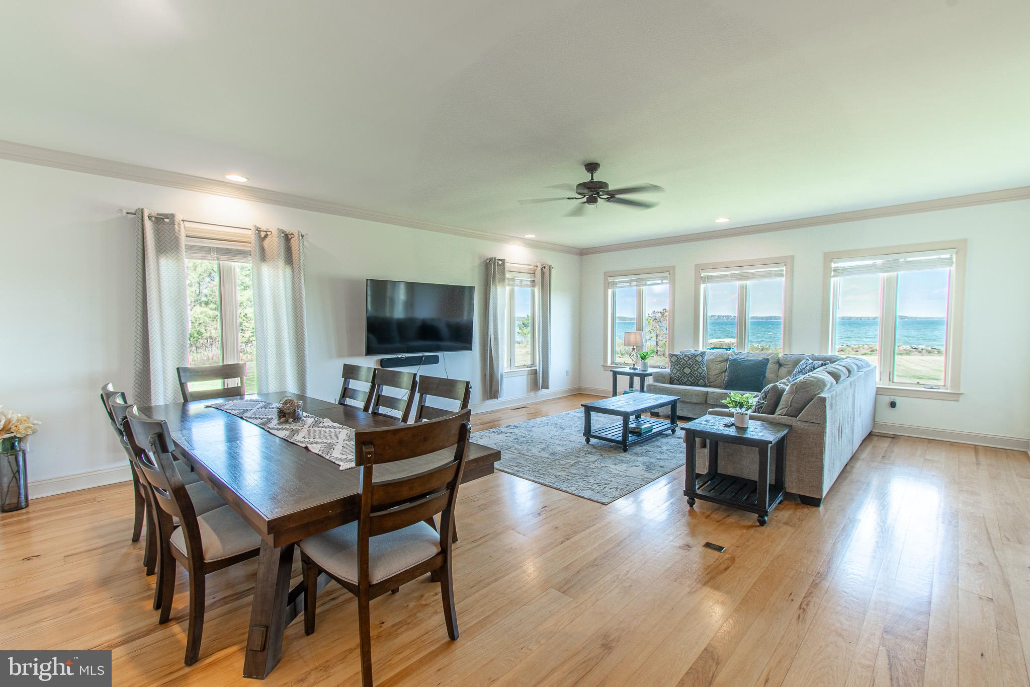 5227 Brooks Road Woolford, MD 21677 - Photo 22 of 68 a living room with furniture and a flat screen tv