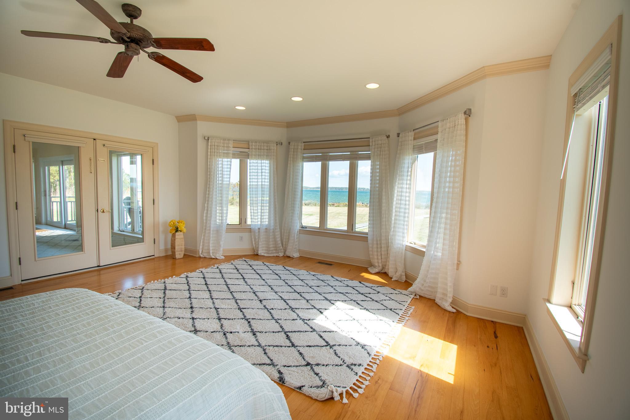 5227 Brooks Road Woolford, MD 21677 - Photo 29 of 68 a bedroom with a large bed and a window