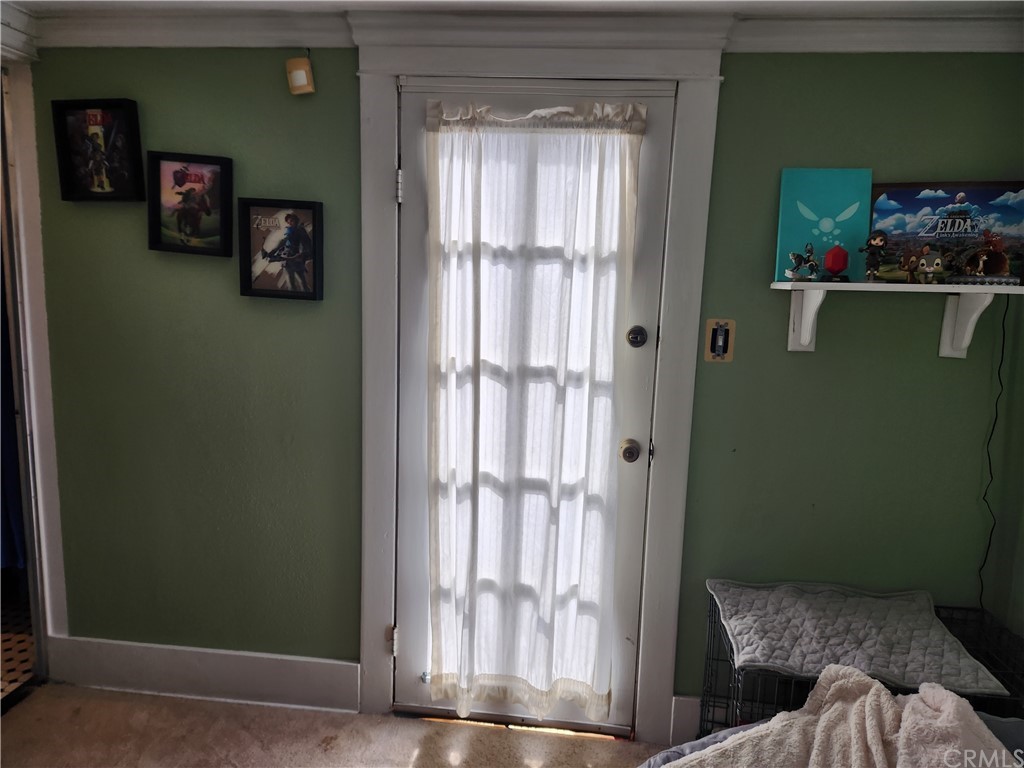4466 11th Street Riverside, CA 92501 - Photo 13 of 17 a view of livingroom with furniture and floor to ceiling window