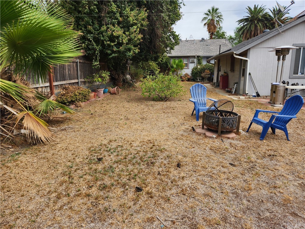 4466 11th Street Riverside, CA 92501 - Photo 14 of 17 a view of backyard of house with seating space
