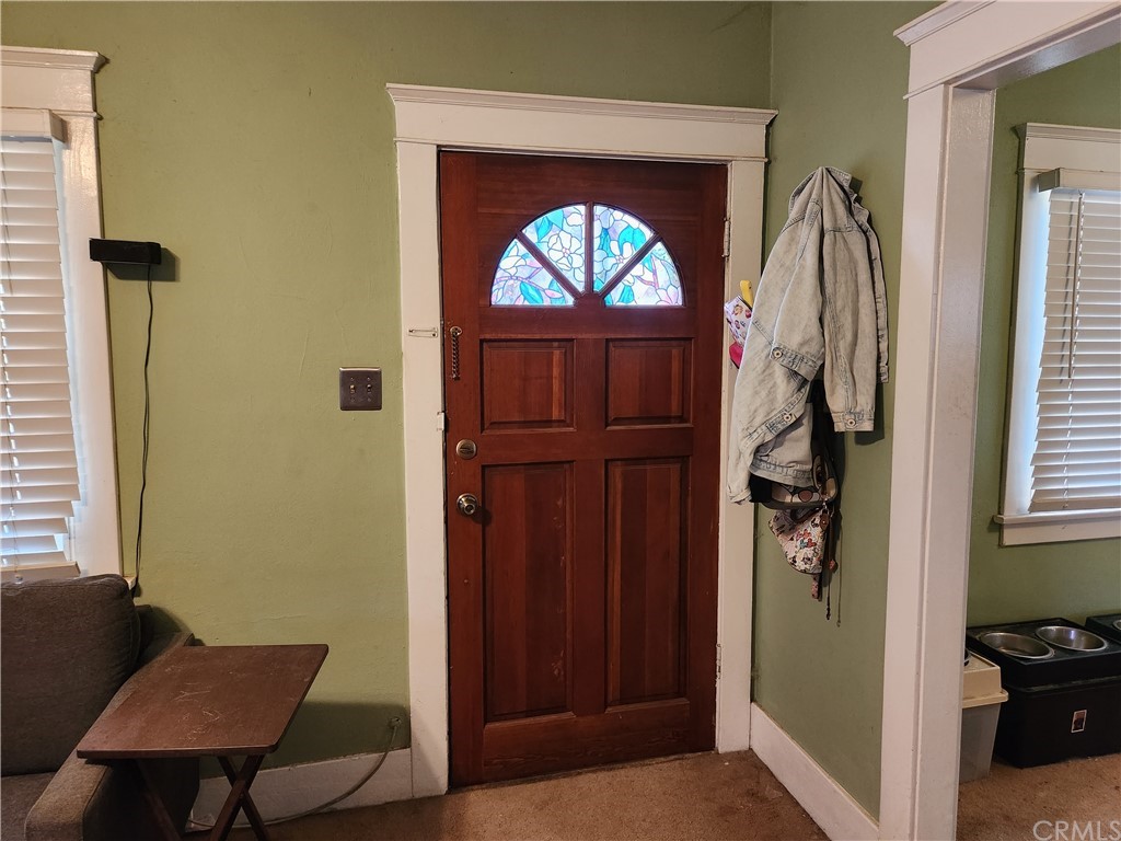 4466 11th Street Riverside, CA 92501 - Photo 2 of 17 a view of a livingroom with furniture and a window