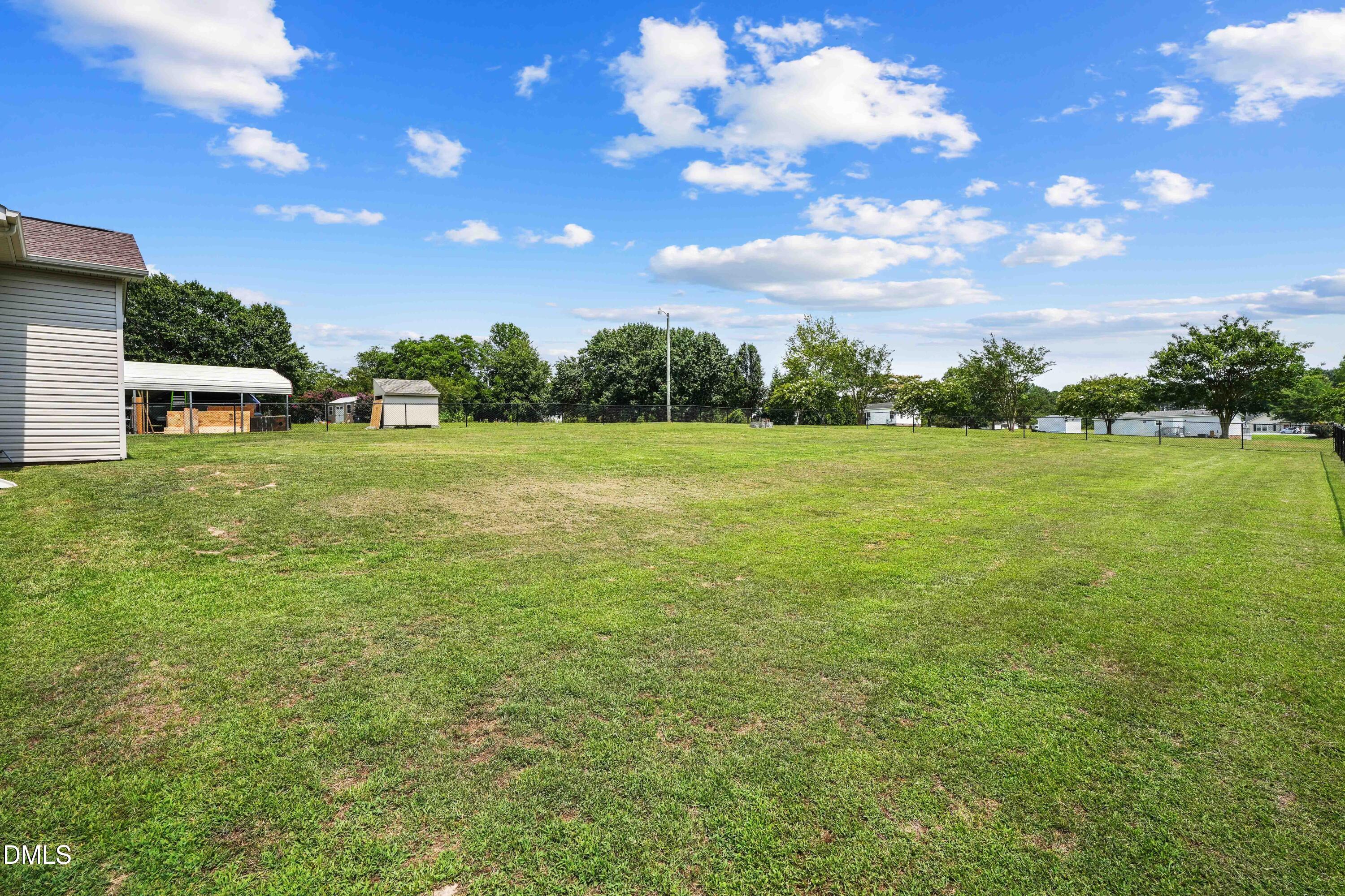 101 Stephenson Road Benson, NC 27504 - Photo 26 of 29 a view of a big yard with a house