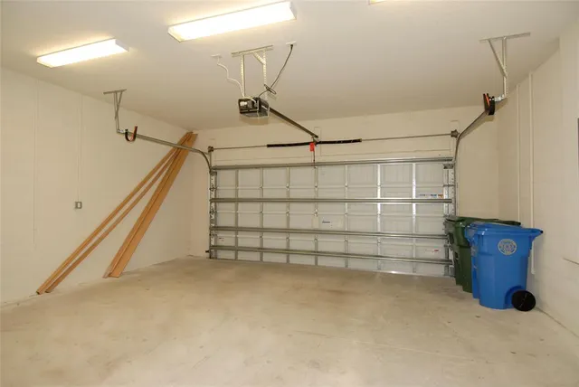 a view of a lake with table and chairs