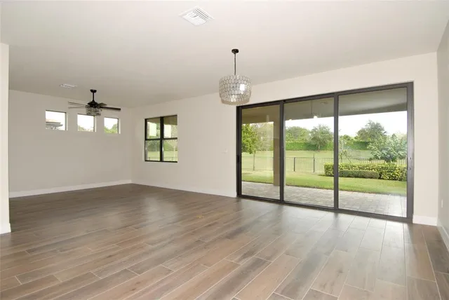 a bathroom with a sink a mirror and toilet