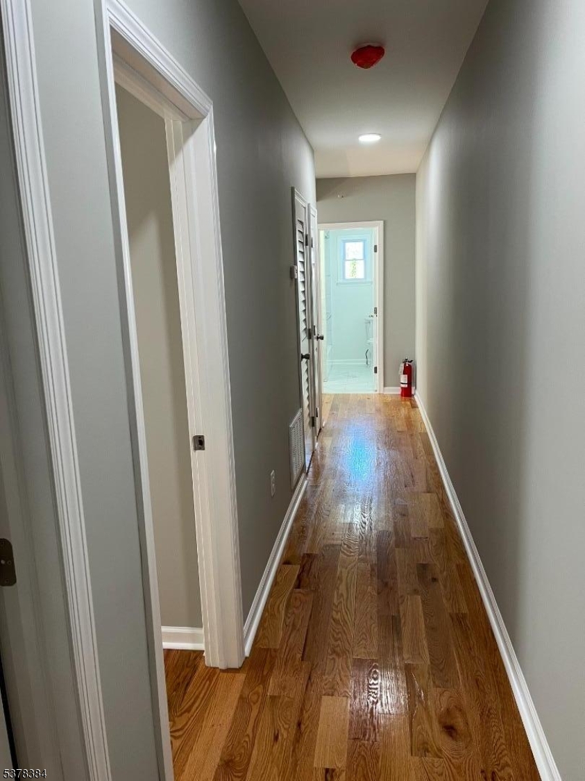 433 Rosehill Place, Unit 3 Elizabeth, NJ 07202 - Photo 8 of 13 a view of entryway with wooden floor