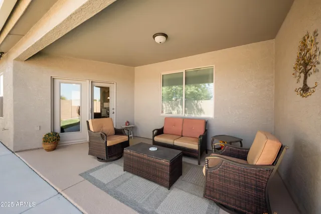 a living room with furniture and a window