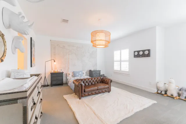 a bathroom with a granite countertop sink mirror toilet and bathtub