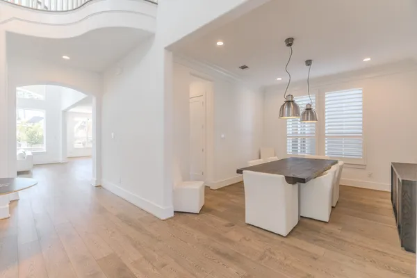 a view of living room filled with furniture and window