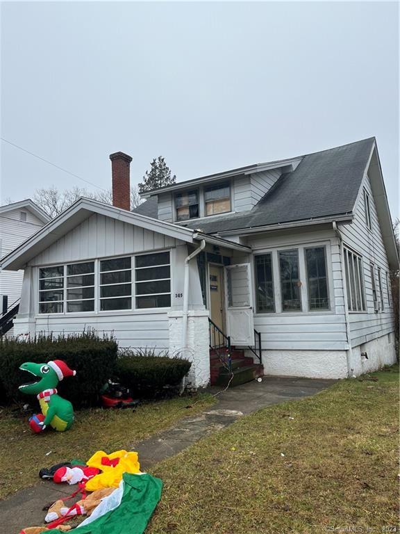 345 Frost Road Waterbury, CT 06705 - Photo 1 of 1 a front view of a house with a yard
