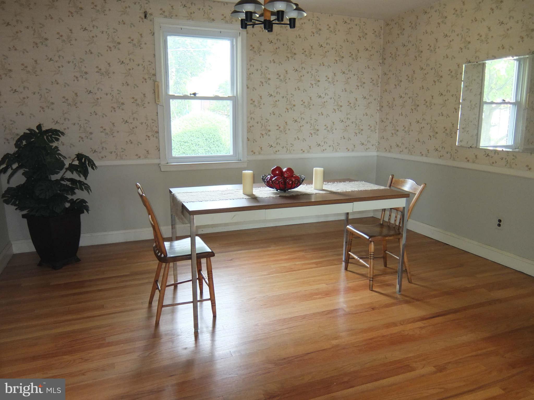 1938 Altavue Road Baltimore, MD 21228 - Photo 7 of 29 Hardwood floors and chair molding