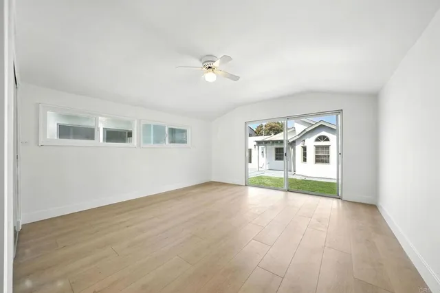 a bathroom with a double vanity sink toilet and shower