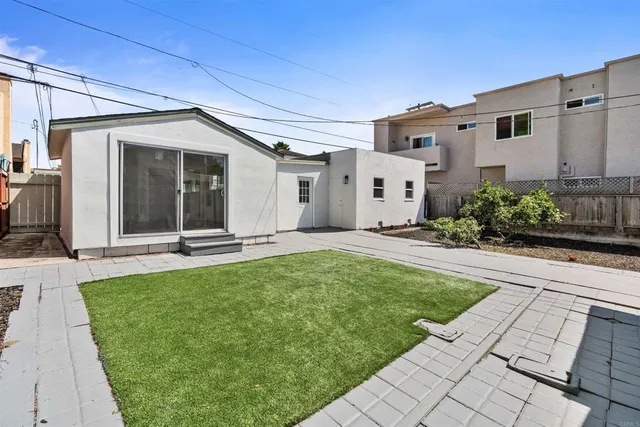 a view of a house with a parking space