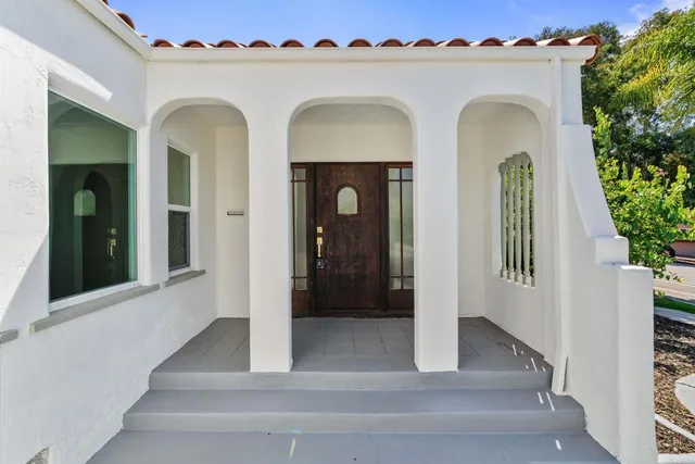 an aerial view of a city with lots of residential buildings