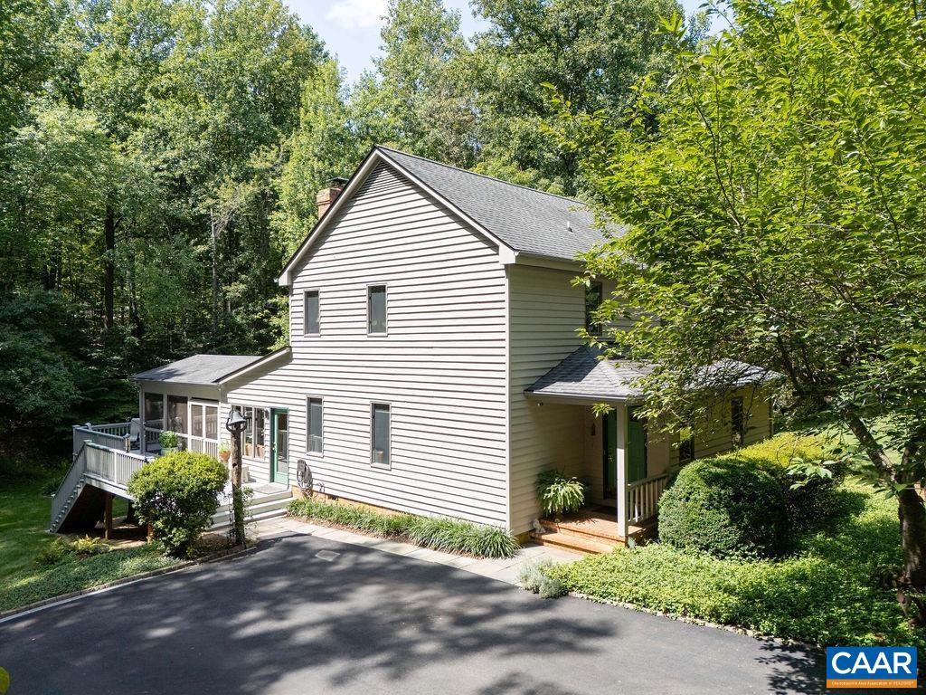 2110 Whippoorwill Road Charlottesville, VA 22901 - Photo 32 of 37 a front view of a house with a yard