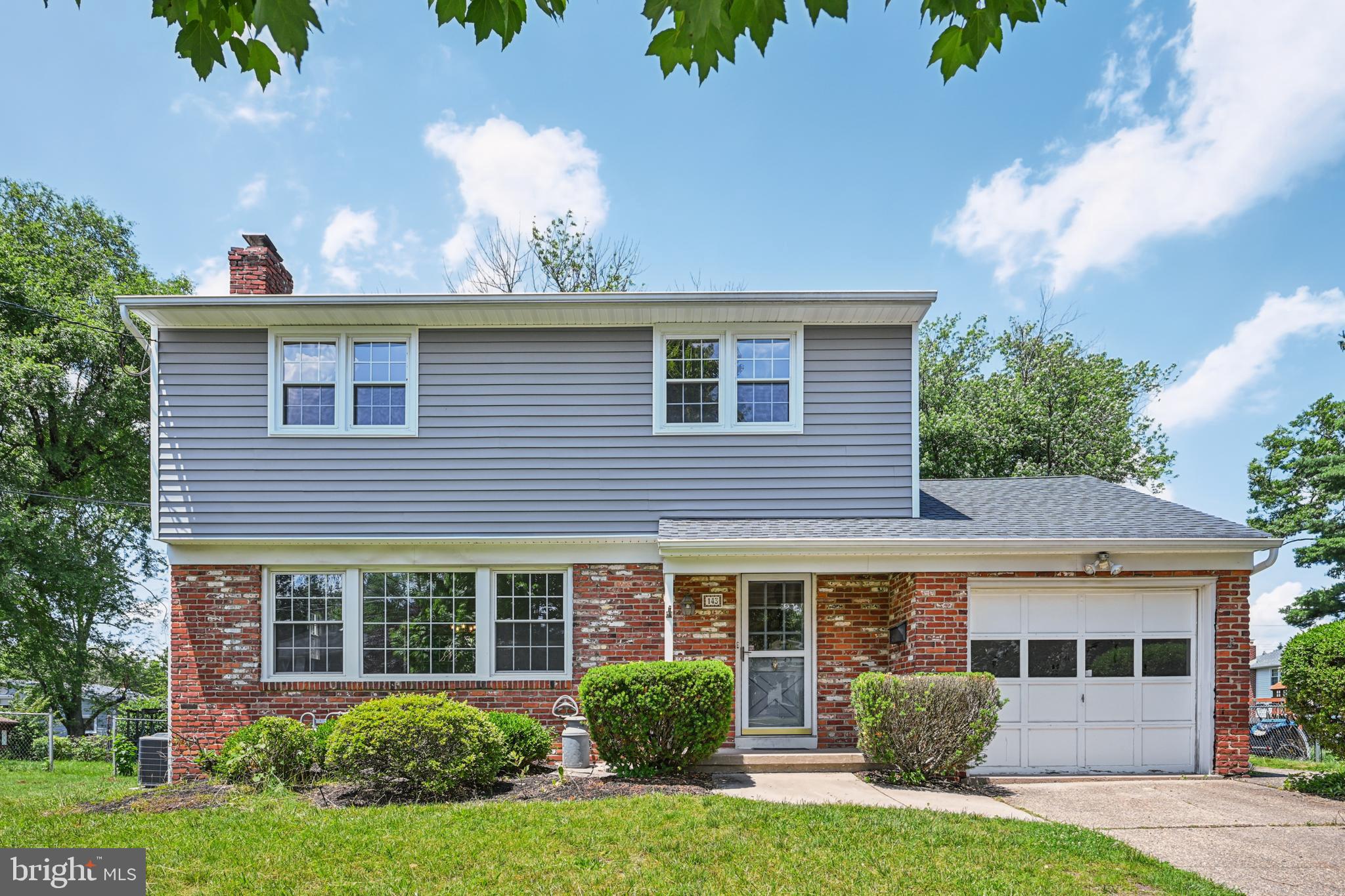 143 Ashbrook Road Cherry Hill, NJ 08034 - Photo 1 of 40 a front view of a house with garden