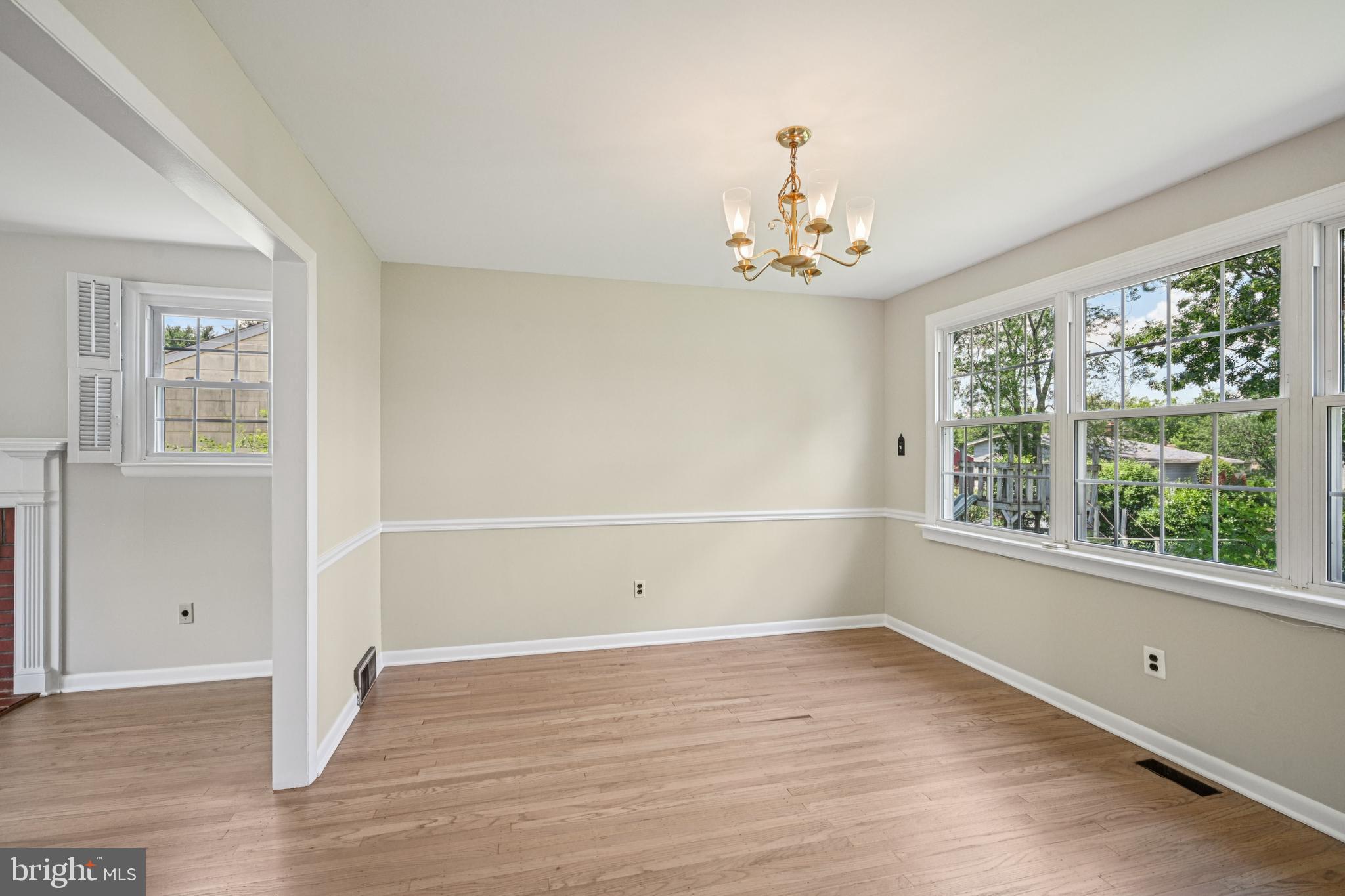 143 Ashbrook Road Cherry Hill, NJ 08034 - Photo 12 of 40 wooden floor in an empty room with a window
