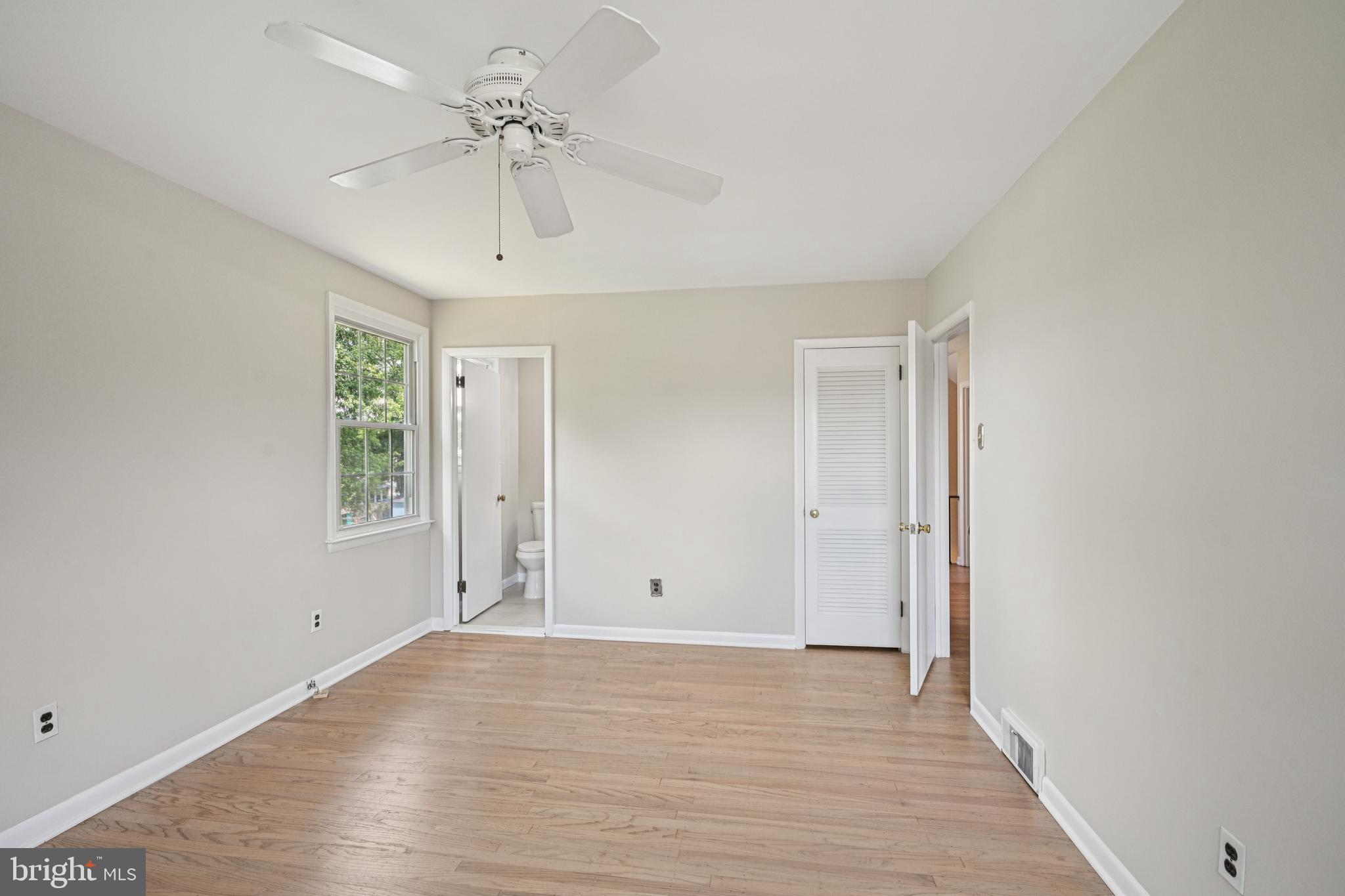 143 Ashbrook Road Cherry Hill, NJ 08034 - Photo 27 of 40 wooden floor in an empty room with a window