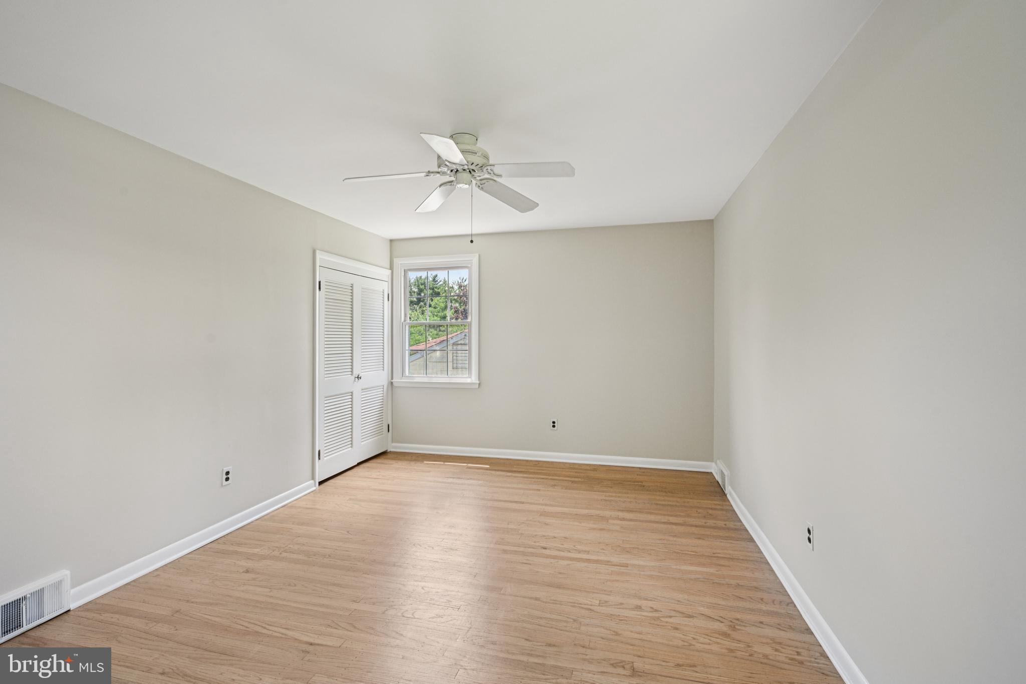 143 Ashbrook Road Cherry Hill, NJ 08034 - Photo 28 of 40 wooden floor in an empty room with a window