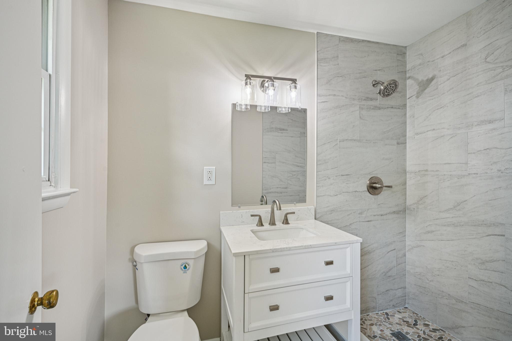 143 Ashbrook Road Cherry Hill, NJ 08034 - Photo 30 of 40 a bathroom with a toilet sink and shower