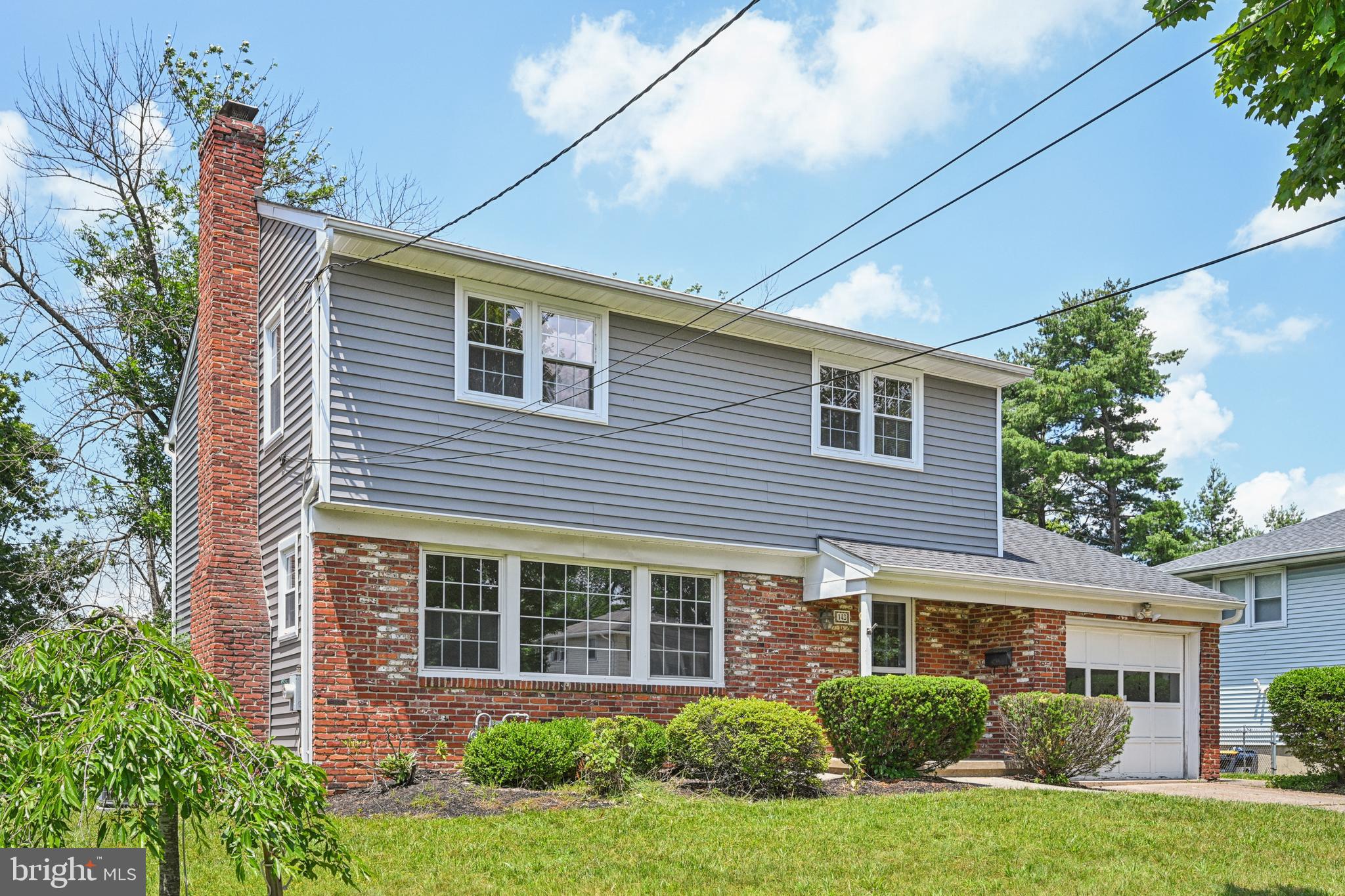 143 Ashbrook Road Cherry Hill, NJ 08034 - Photo 3 of 40 front view of a house with a yard