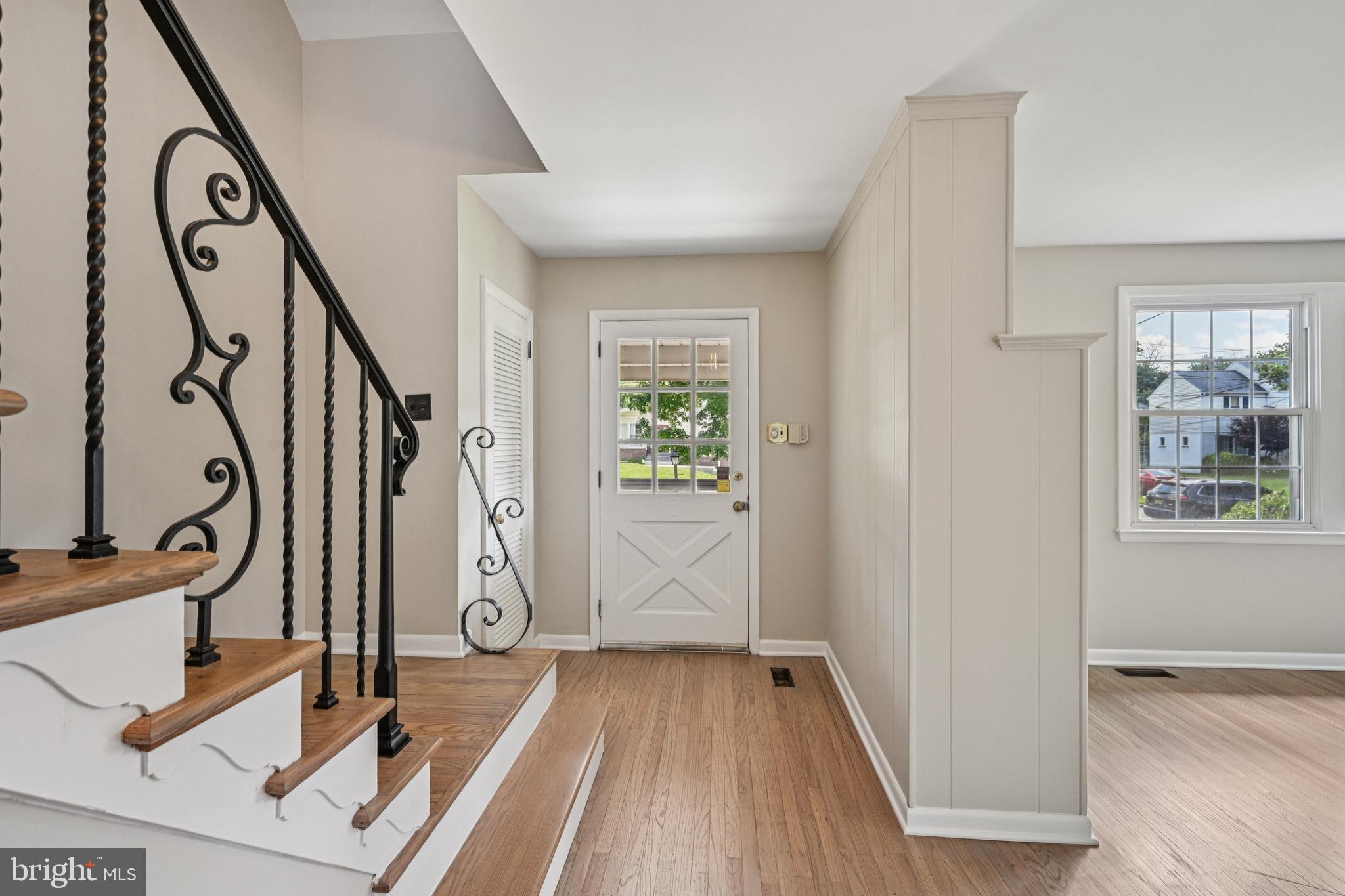143 Ashbrook Road Cherry Hill, NJ 08034 - Photo 5 of 40 a view of an entryway with wooden floor