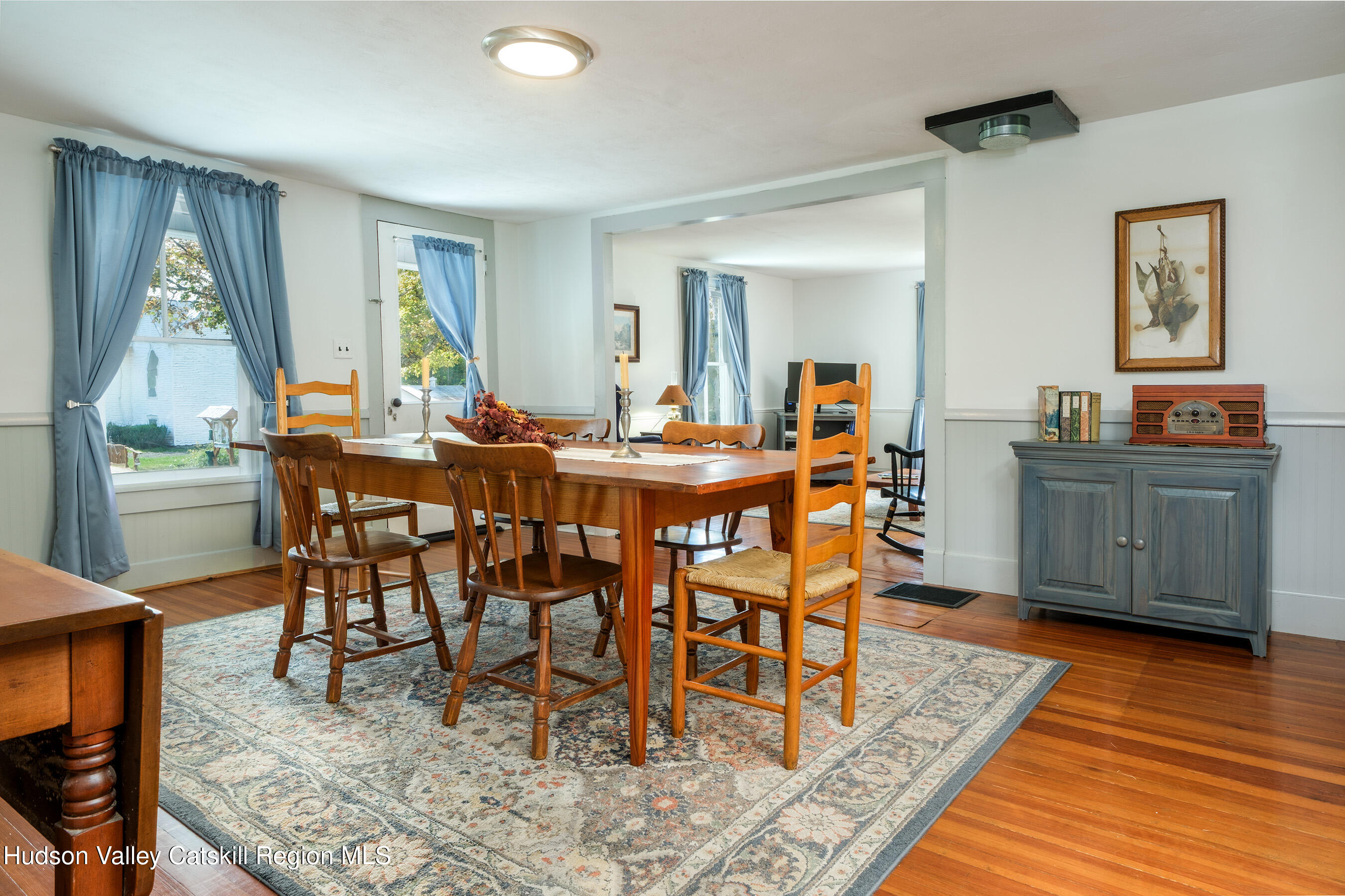 70 Case Hill Road Treadwell, NY 13846 - Photo 15 of 50 a view of a dining room with furniture and wooden floor