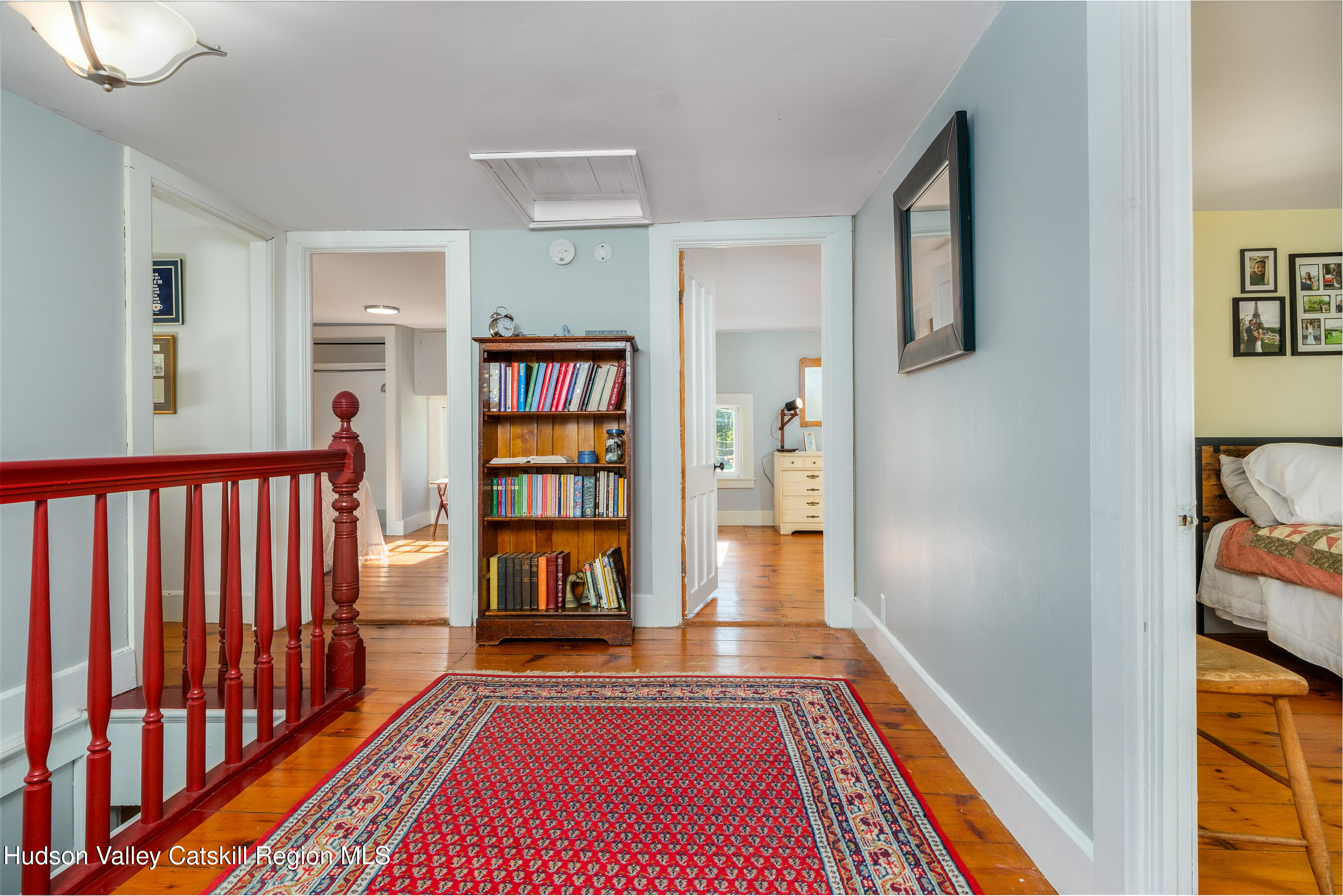 70 Case Hill Road Treadwell, NY 13846 - Photo 29 of 50 a view of a hallway with wooden floor and furniture