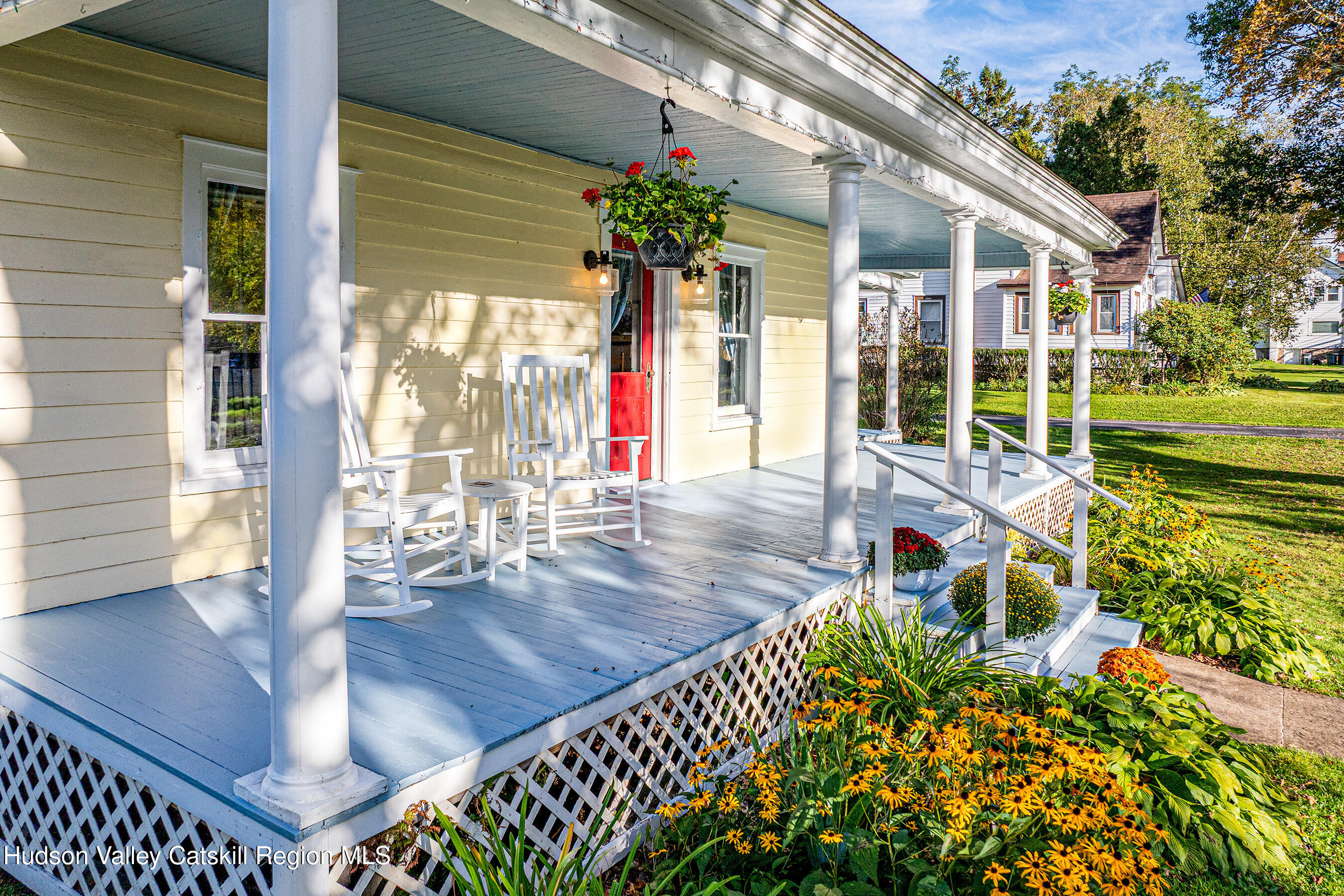 70 Case Hill Road Treadwell, NY 13846 - Photo 6 of 50 a view of a balcony with chairs and potted plants