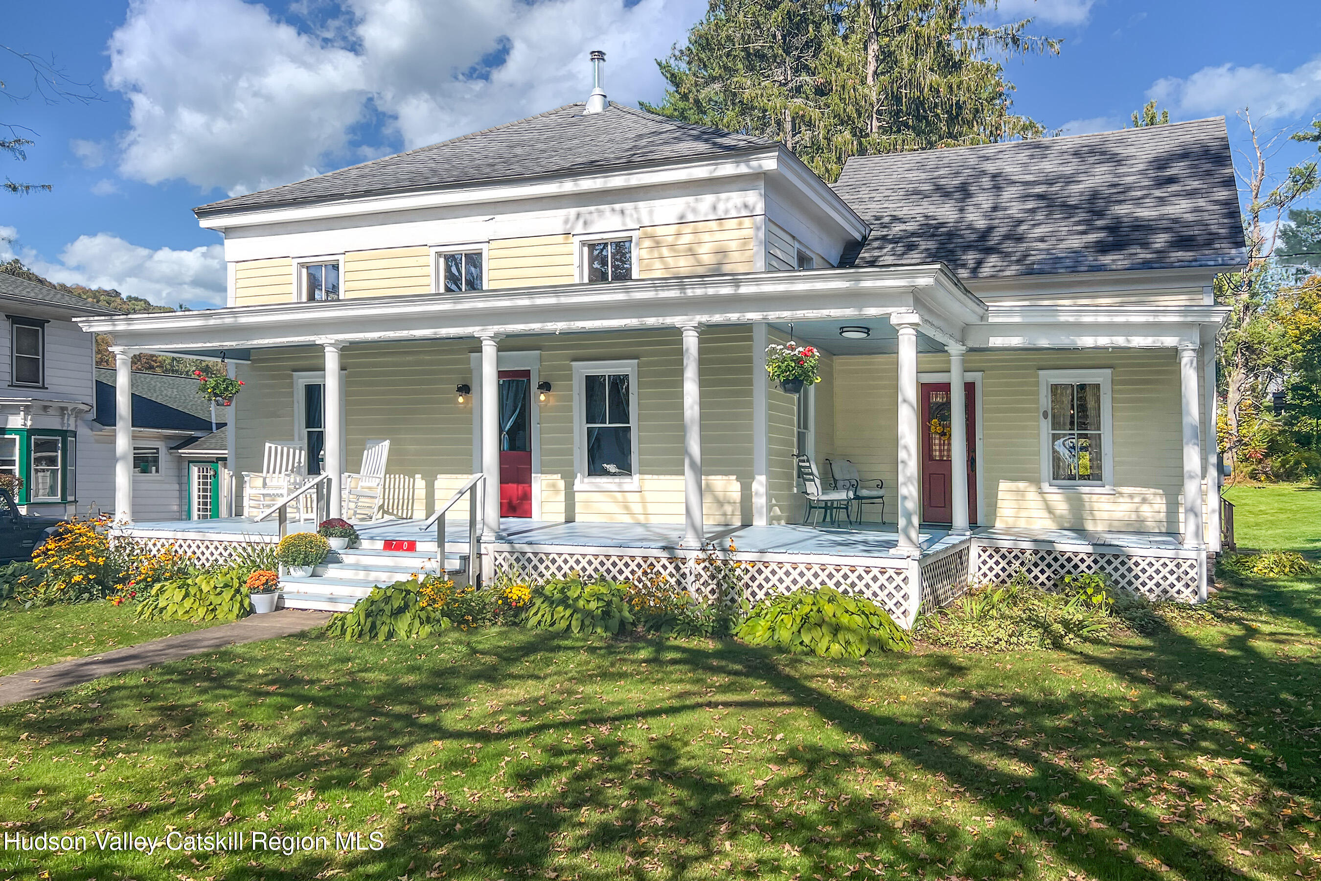 70 Case Hill Road Treadwell, NY 13846 - Photo 10 of 50 front view of a brick house with a large window