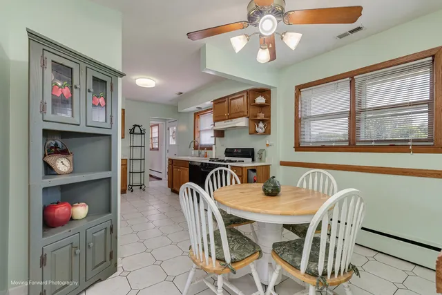 a view of a dining room with furniture