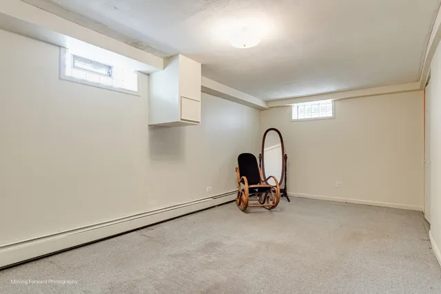 a view of a room with a sink and a window