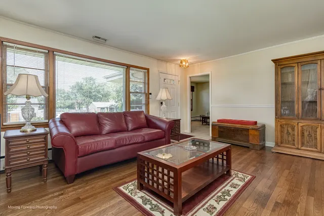 a living room with furniture and a window