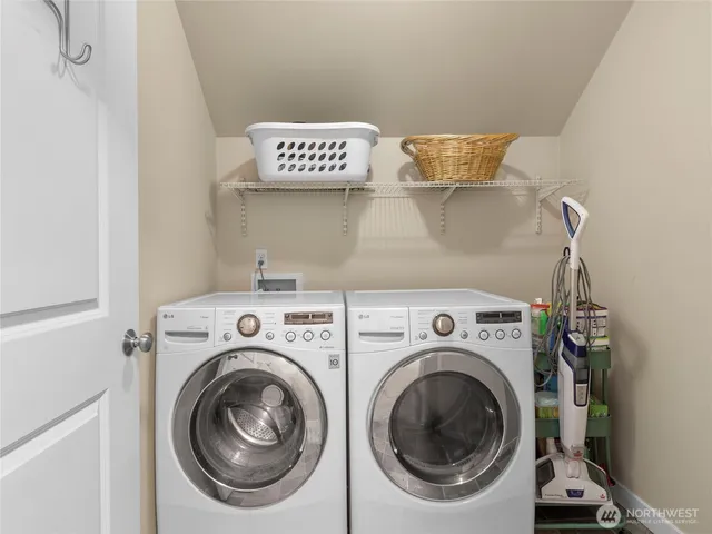 a utility room with dryer and washer