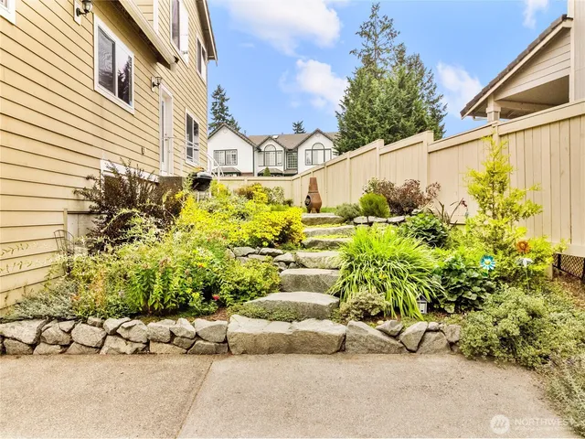 a view of a back yard of the house