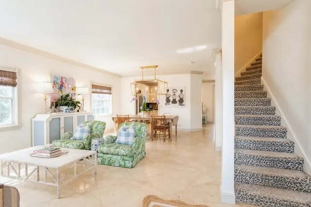 a living room with furniture and a table