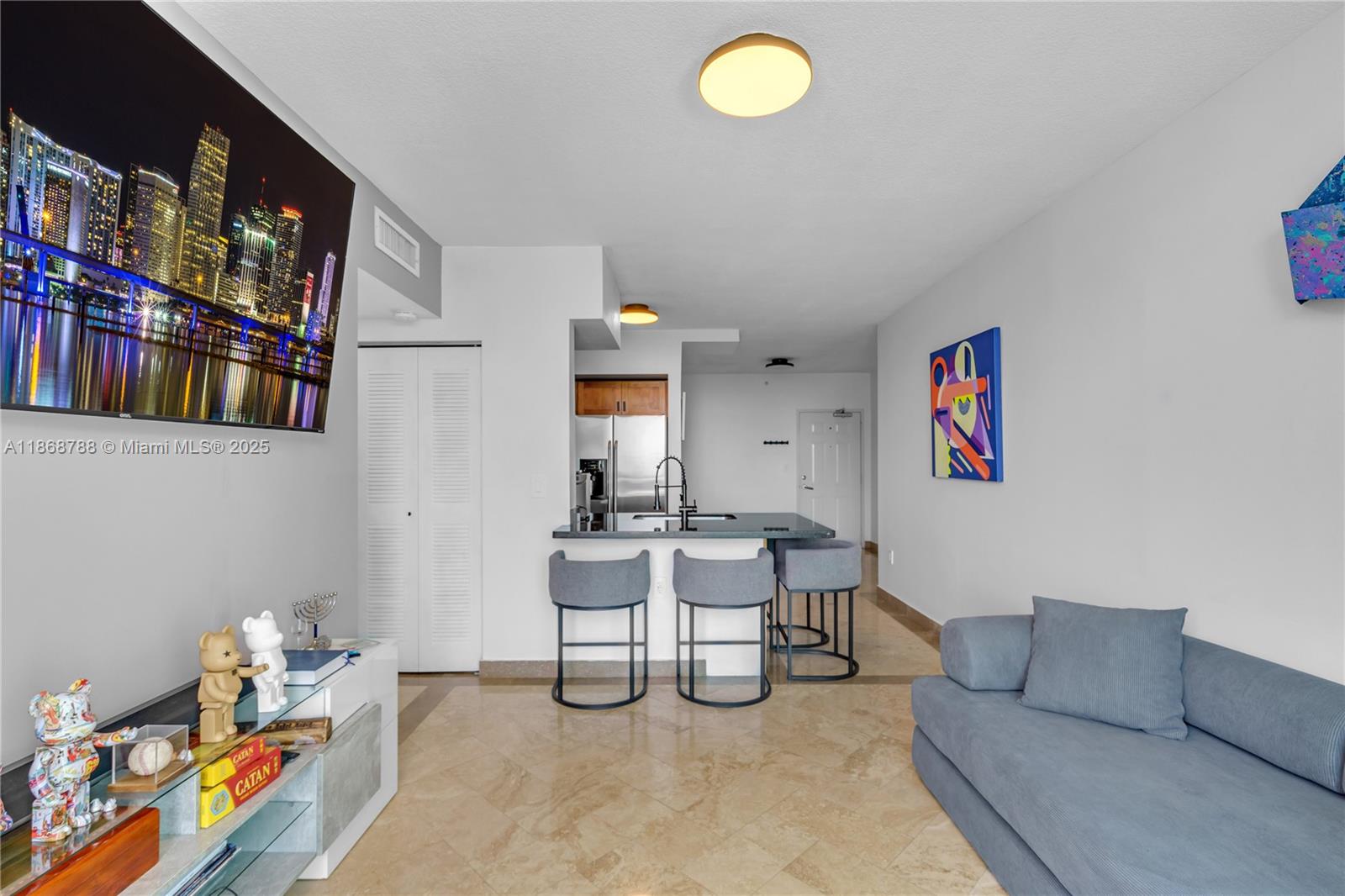 1723 Southwest 2nd Avenue, Unit 902 Miami, FL 33129 - Photo 15 of 33 a living room with furniture