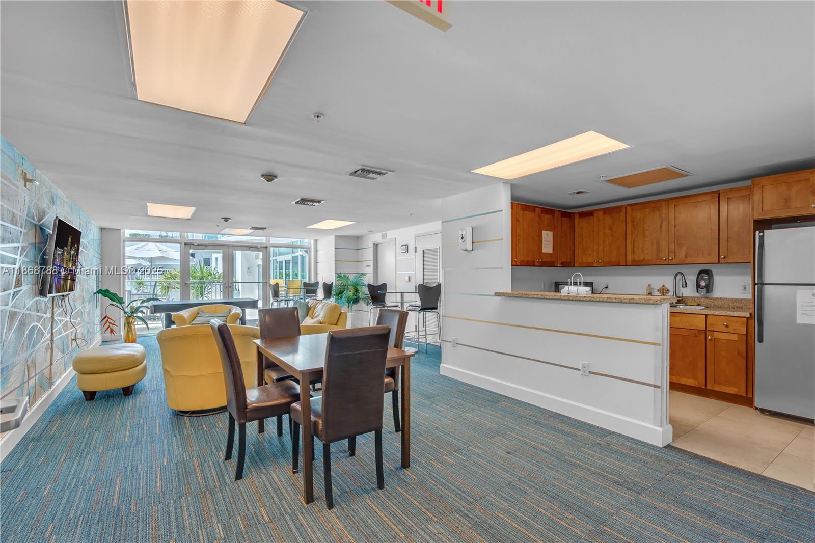 1723 Southwest 2nd Avenue, Unit 902 Miami, FL 33129 - Photo 29 of 33 a dining room with furniture and wooden floor