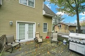 a white house with a table and chairs