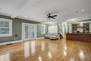 a view of livingroom with furniture window and wooden floor