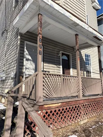 a view of a entrance with stairs