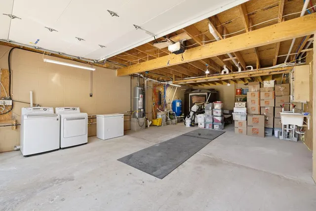 a view of parking garage with cars