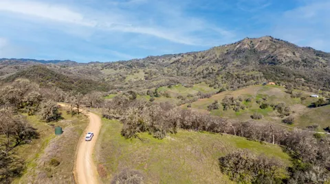 a view of mountain view with mountains in the background