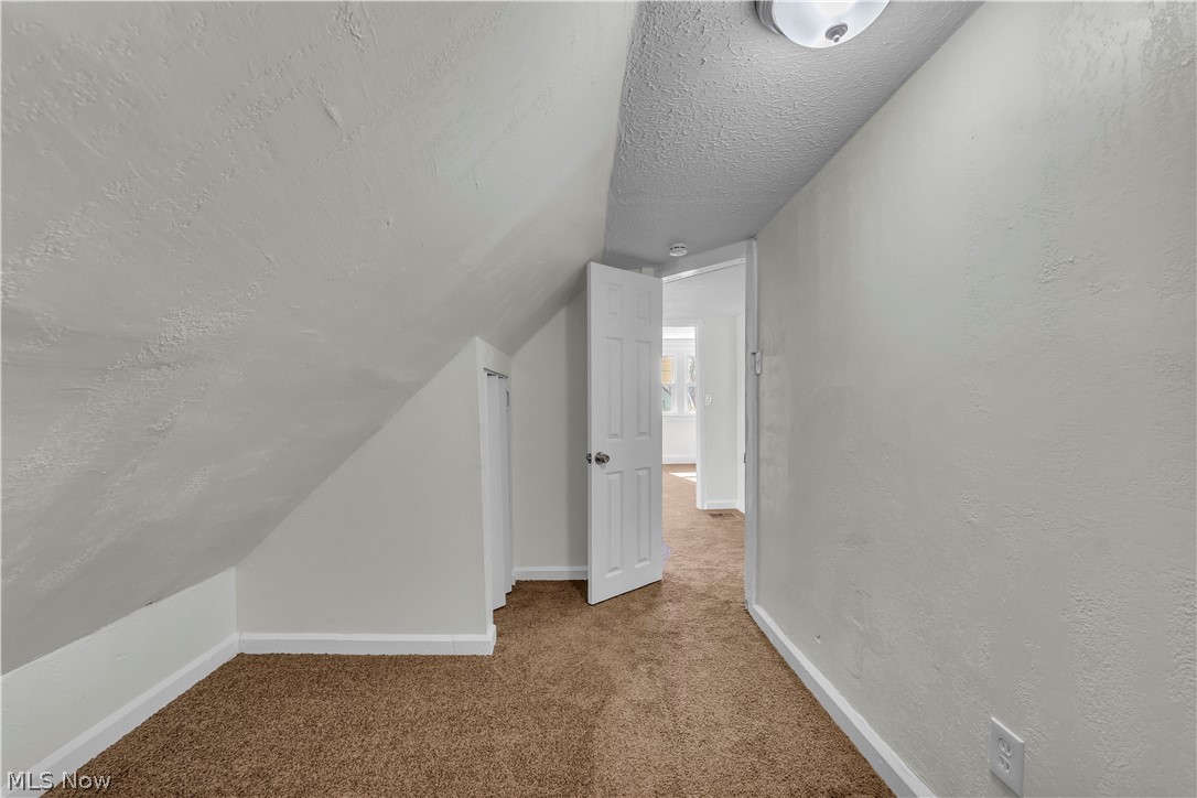 12905 Watterson Avenue Cleveland, OH 44105 - Photo 23 of 30 Bonus room featuring carpet floors and baseboards