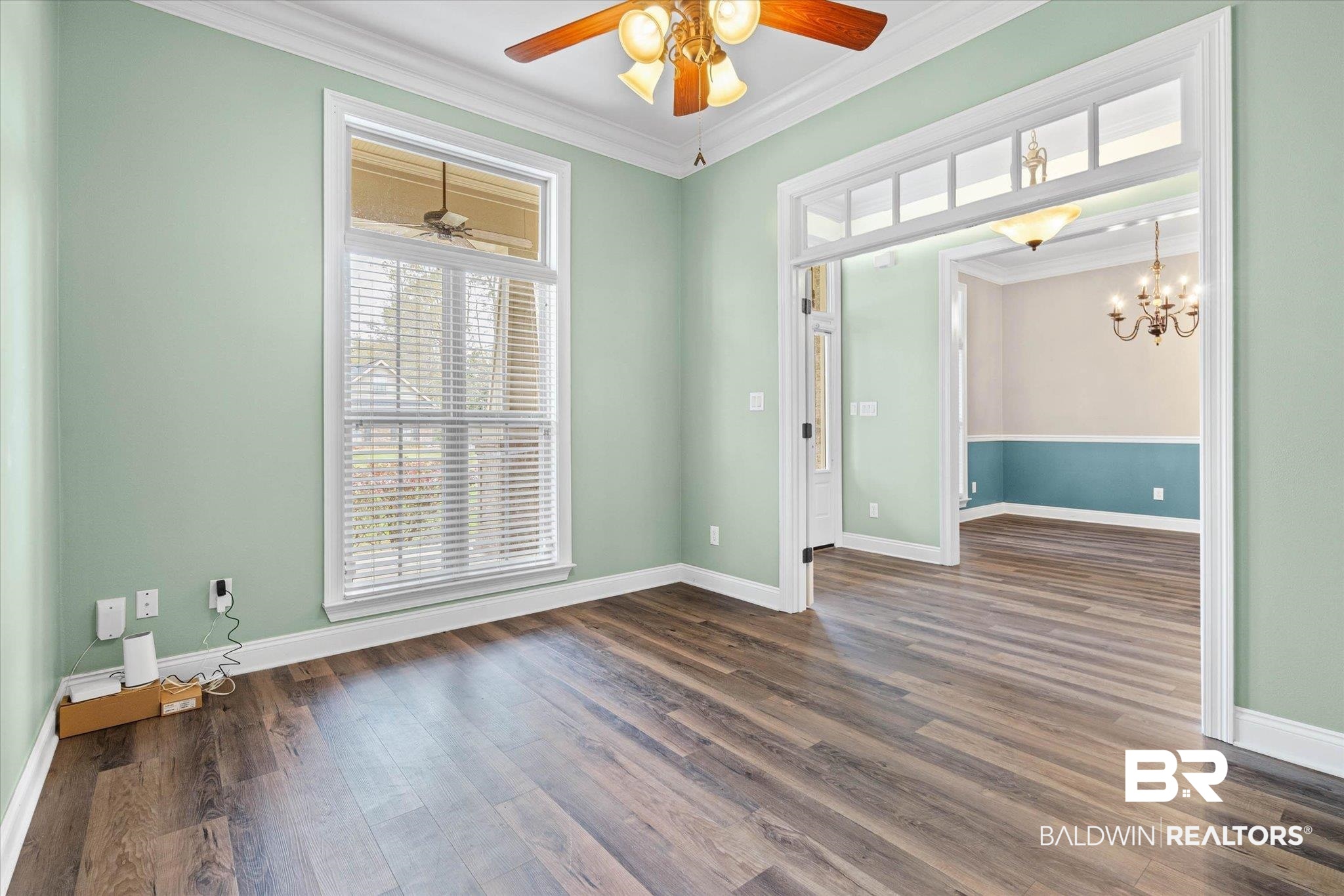 704 Edinburgh Avenue Foley, AL 36535 - Photo 10 of 32 Office featuring crown molding, a ceiling fan, dark wood finished floors, and suspended lighting