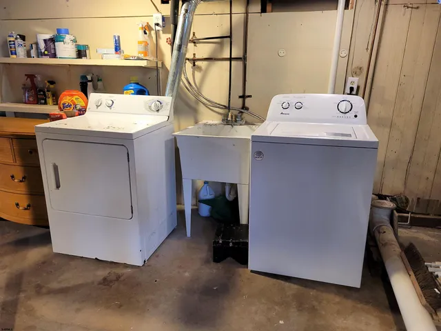 a utility room with dryer and washer