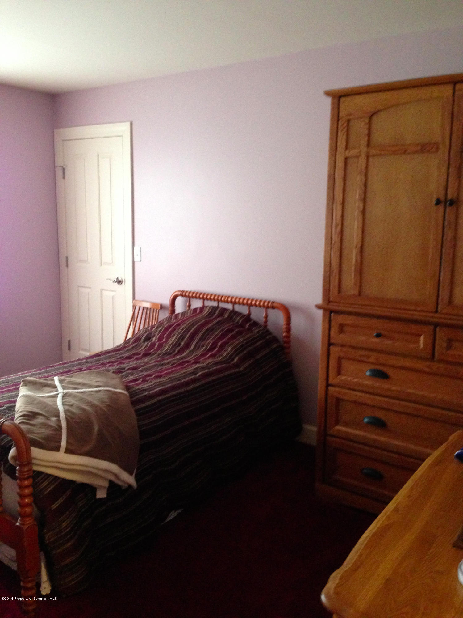 20 Green Acres Road Tunkhannock, PA 18657 - Photo 12 of 40 a bedroom with a bed and cabinets