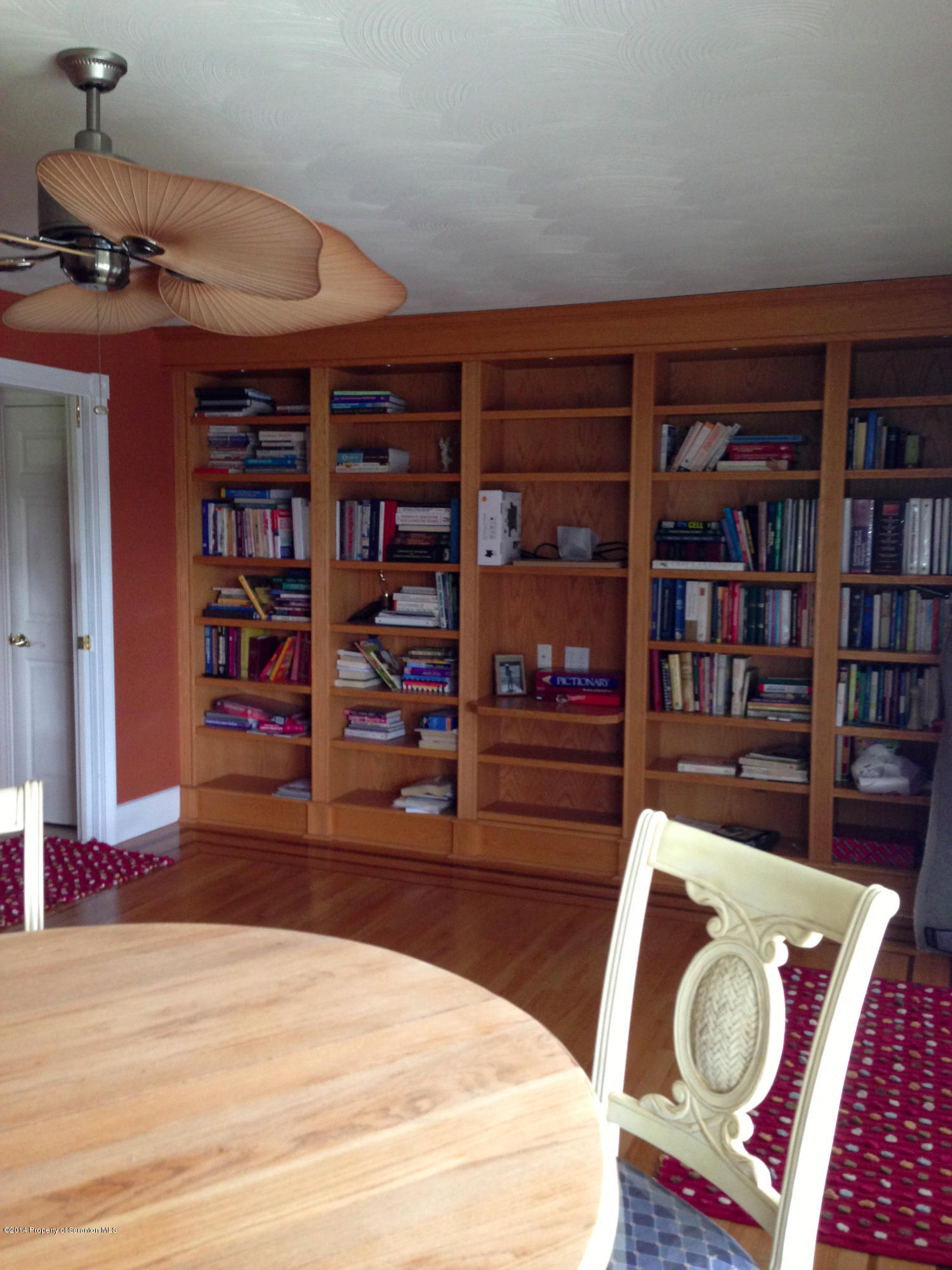 20 Green Acres Road Tunkhannock, PA 18657 - Photo 7 of 40 a living room with furniture and a book shelf
